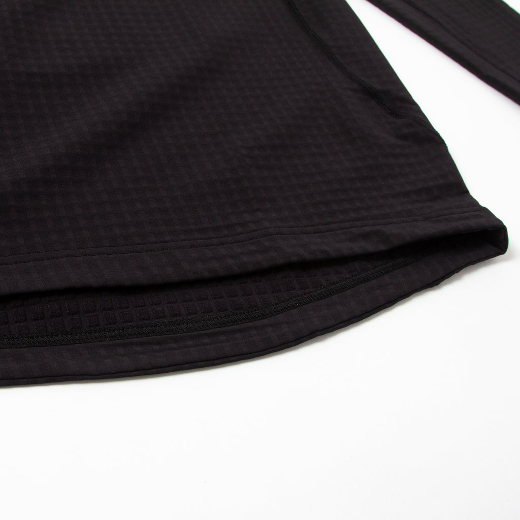 ハーフジップ ストームフリース  -ブラック