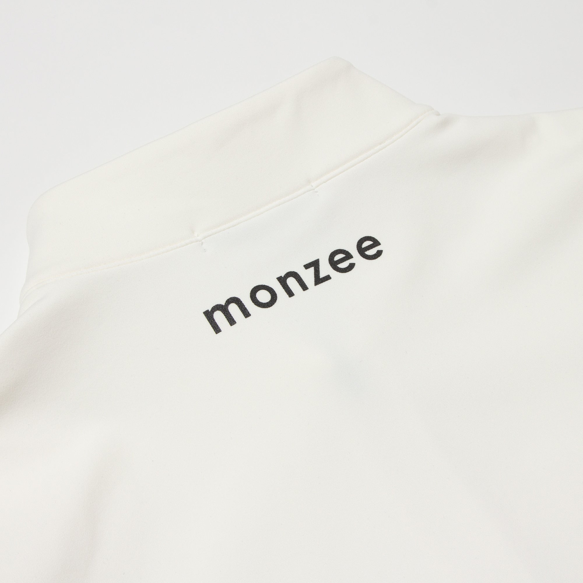 monzee ハーフジップ ホワイト